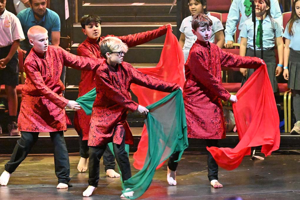 Secondary school dancers perform on stage at the Royal Albert Hall.